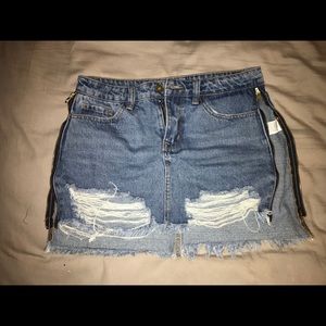 Denim skirt with gold zippers